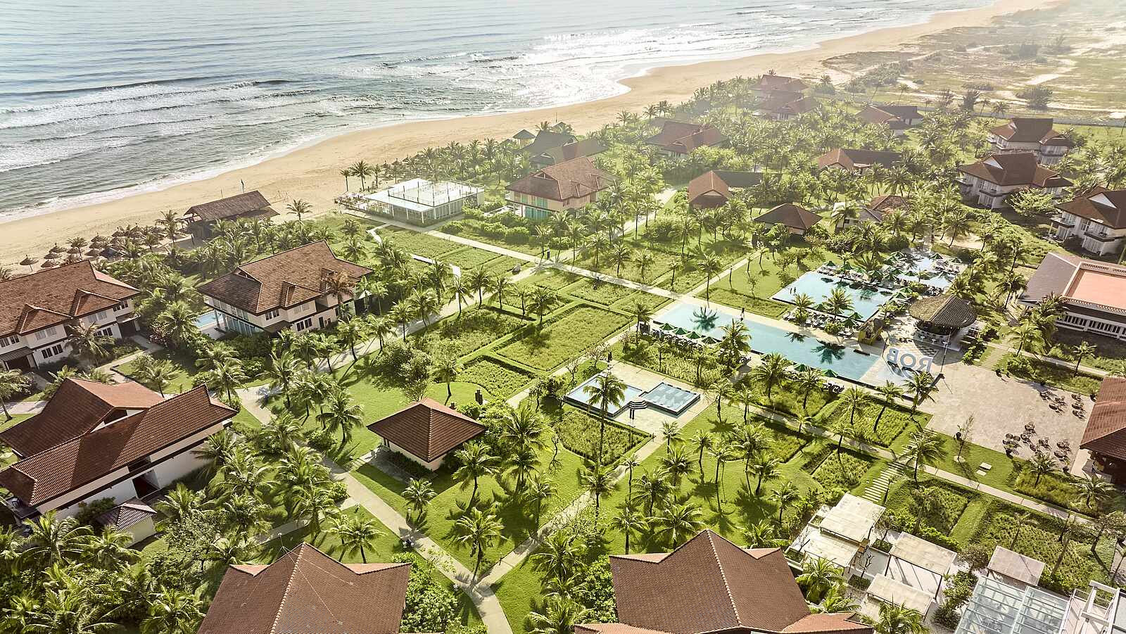 Front of zip tote bag with white canvas, black canvas straps and handle, and black zipper pulls.